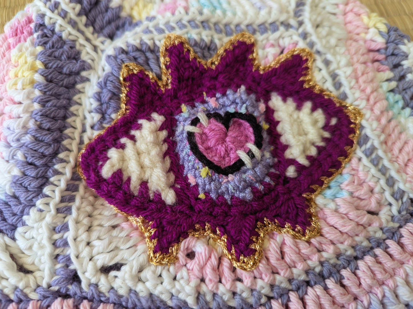 Spiral x Eye Crochet hat in Pastel Pink and Purple