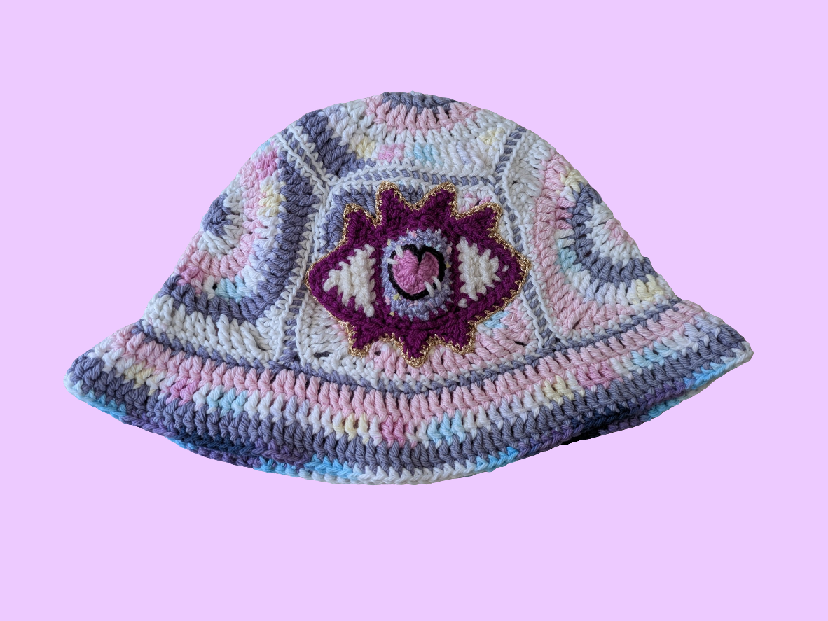 Spiral x Eye Crochet hat in Pastel Pink and Purple