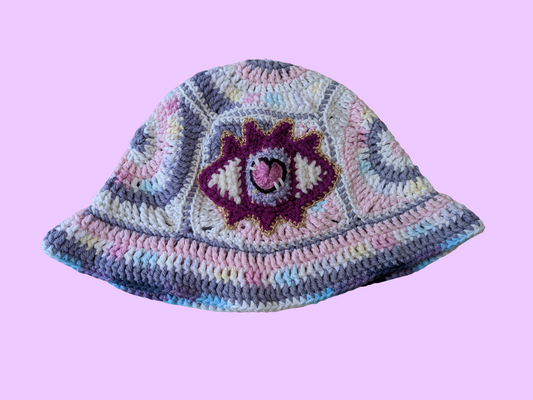 Spiral x Eye Crochet hat in Pastel Pink and Purple