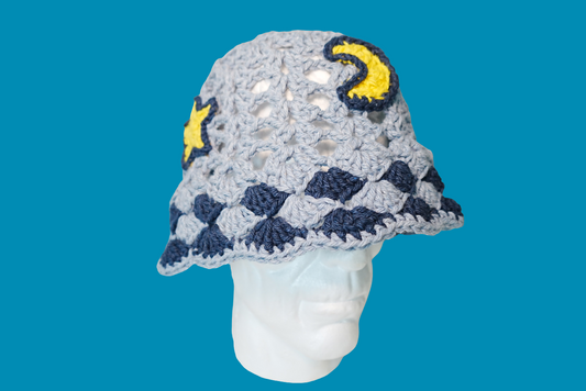 A Moon and Stars Crochet Hat in Denim Blue color
