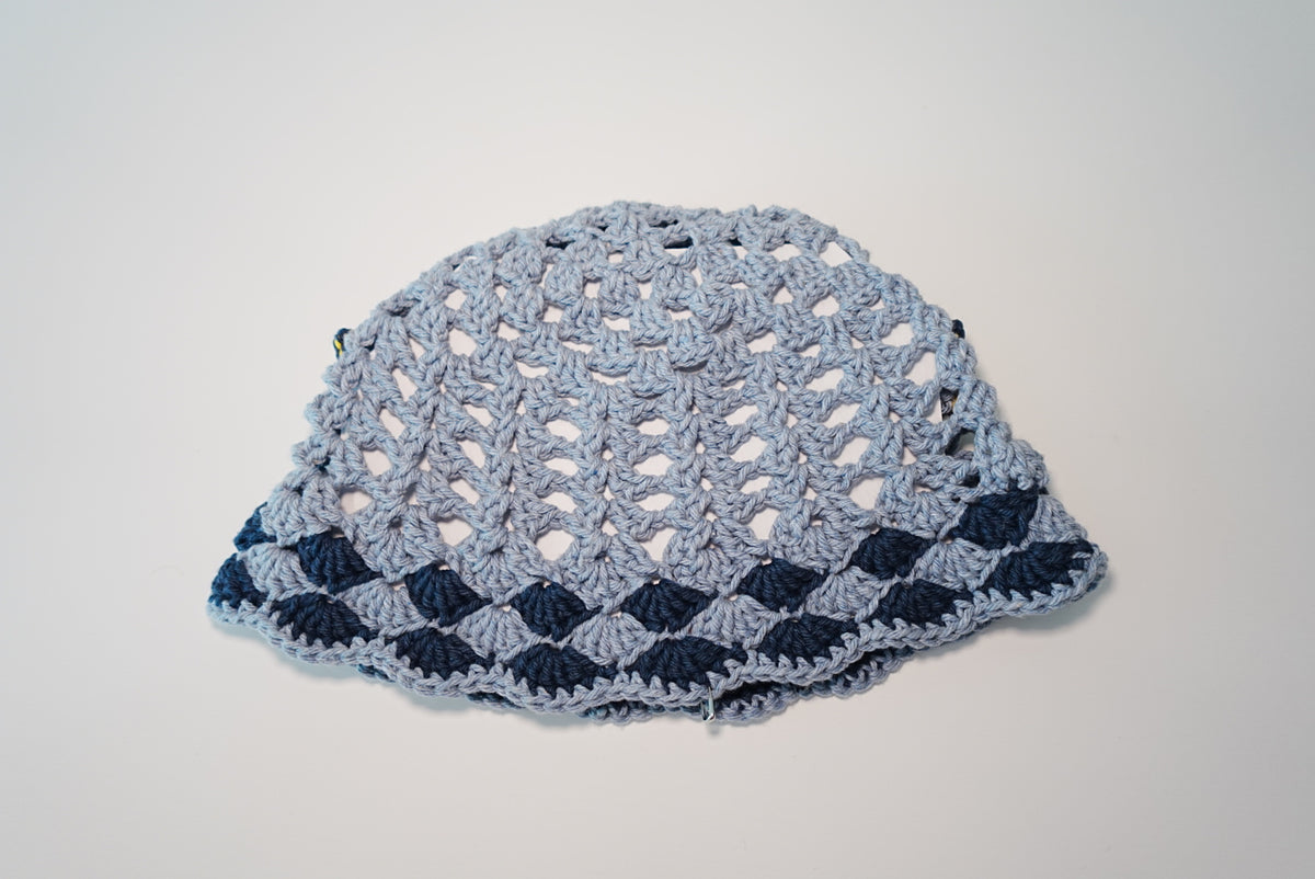 A Moon and Stars Crochet Hat in Denim Blue color