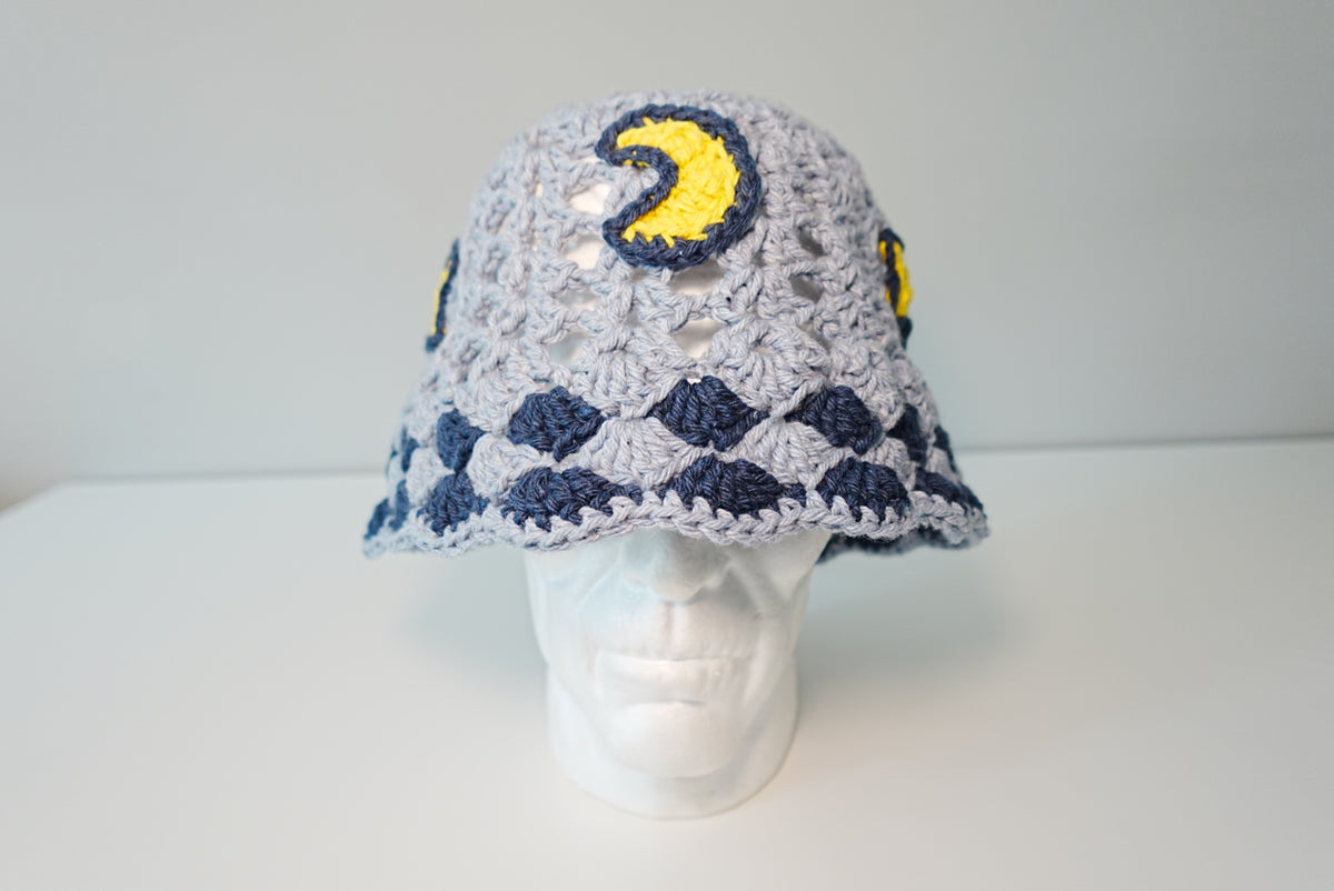 A Moon and Stars Crochet Hat in Denim Blue color